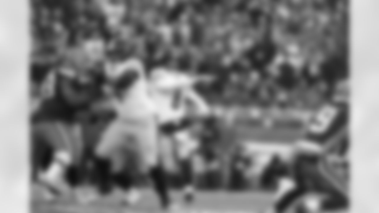 Pittsburgh Steelers offensive lineman Spencer Anderson (74) and Pittsburgh Steelers quarterback Aaron Rodgers (8) during a regular season game between the Pittsburgh Steelers and the Cleveland Browns, Sunday, Dec. 28, 2025 in Cleveland, OH. (Karl Roser / Pittsburgh Steelers)