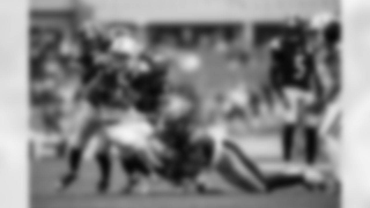 Pittsburgh Steelers safety Kyle Dugger (29), linebacker Patrick Queen (6), cornerback Brandin Echols (26) and cornerback Darius Slay (23) tackle an opponent during a regular season game between the Pittsburgh Steelers and the Indianapolis Colts, Sunday, Nov. 2, 2025 in Pittsburgh, PA. The Steelers defeated the Colts 27-20. (Alysa Rubin / Pittsburgh Steelers)