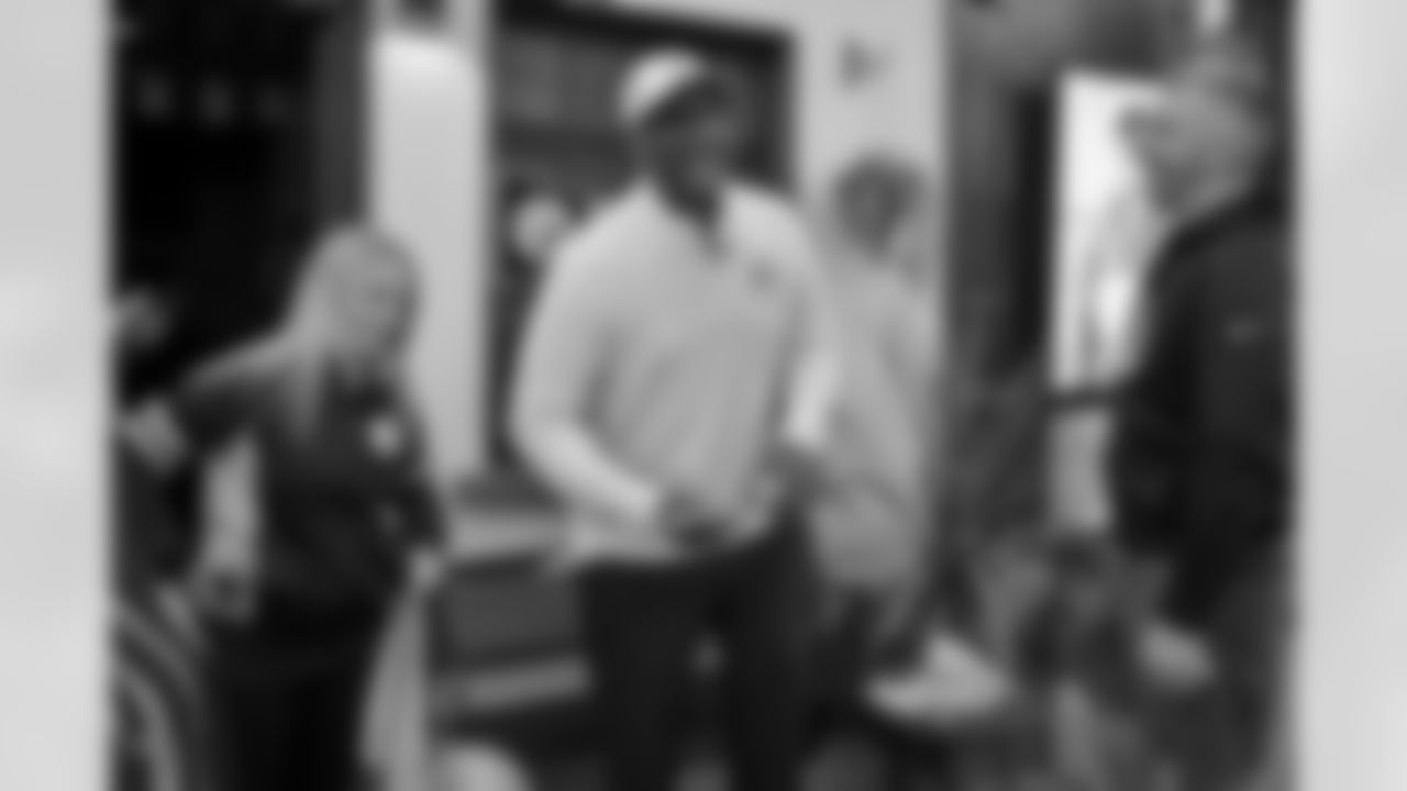 Pittsburgh Steelers legend Max Starks gives out Terrible Towels to locals on Tuesday, Sept. 23, 2025 in Gort, Ireland. (Brendan Moran / Pittsburgh Steelers)