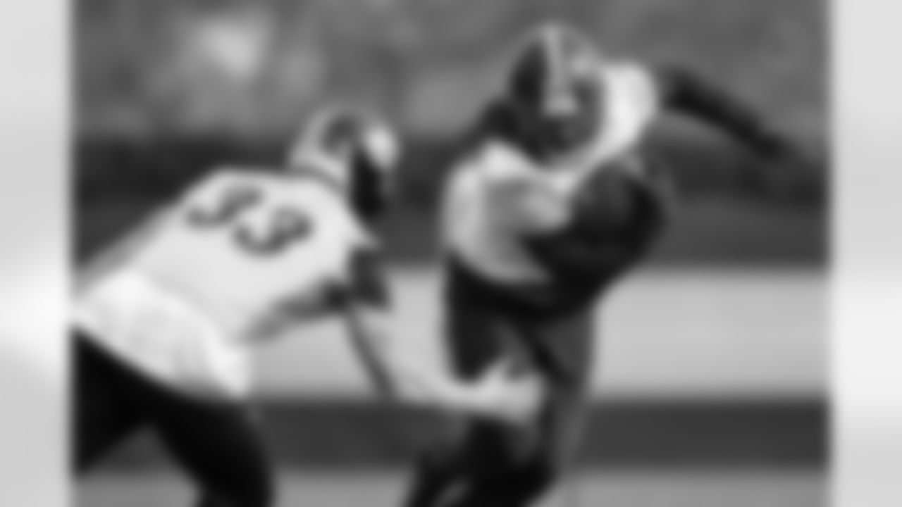 Pittsburgh Steelers linebacker Jack Sawyer (33) and Pittsburgh Steelers tight end/fullback Connor Heyward (83) during practice at the UPMC Rooney Sports Complex preparing for a Week 10 matchup against the Los Angeles Chargers, Friday, Nov. 7, 2025 in Pittsburgh, PA. (Alysa Rubin / Pittsburgh Steelers)