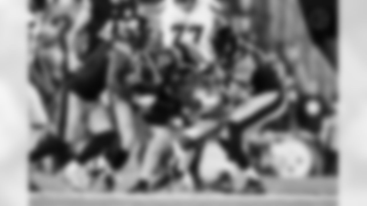 Pittsburgh Steelers defensive tackle Cameron Heyward (97) and linebacker Alex Highsmith (56) during a postseason Wild Card game between the Pittsburgh Steelers and the Houston Texans, Monday, Jan. 12, 2026 in Pittsburgh, PA. (Alysa Rubin / Pittsburgh Steelers)