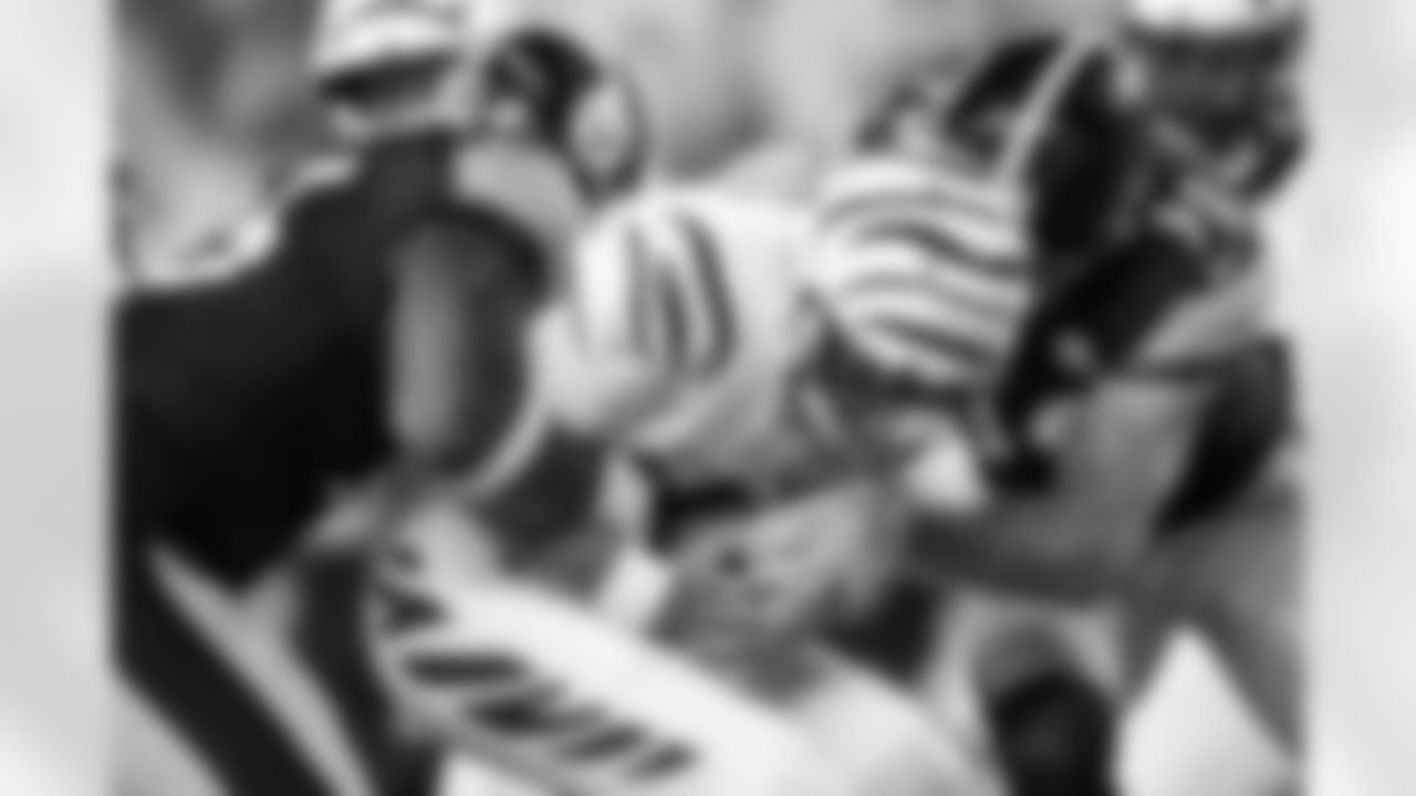 Pittsburgh Steelers defensive tackle Keeanu Benton (95) and Pittsburgh Steelers linebacker T.J. Watt (90) sack Cincinnati Bengals quarterback Joe Flacco (16) during a regular season game, Thursday, Oct. 16, 2025 in Cincinnati, OH. The Bengals beat the Steelers 33-31. (Alysa Rubin / Pittsburgh Steelers)