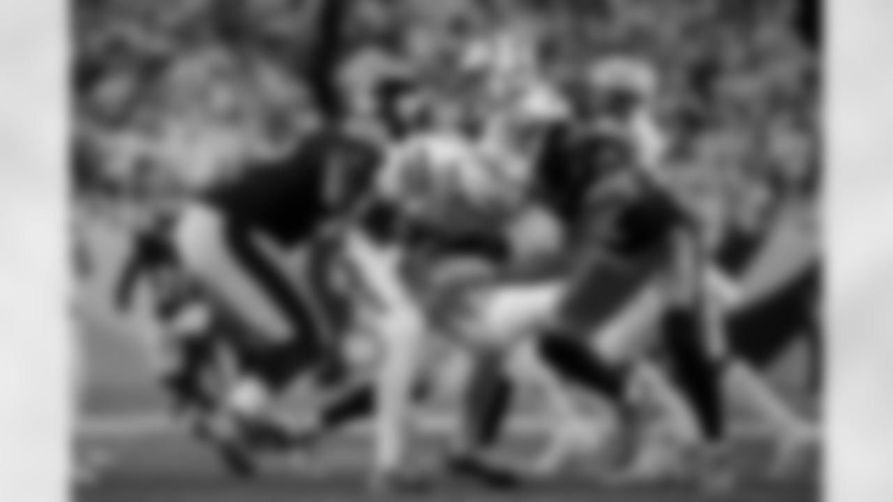 Pittsburgh Steelers defensive tackle Keeanu Benton (95) and Pittsburgh Steelers linebacker T.J. Watt (90) sack Cincinnati Bengals quarterback Joe Flacco (16) during a regular season game between the Pittsburgh Steelers and the Cincinnati Bengals, Thursday, Oct. 16, 2025 in Cincinnati, OH. The Bengals beat the Steelers 33-31. (Taylor Ollason / Pittsburgh Steelers)