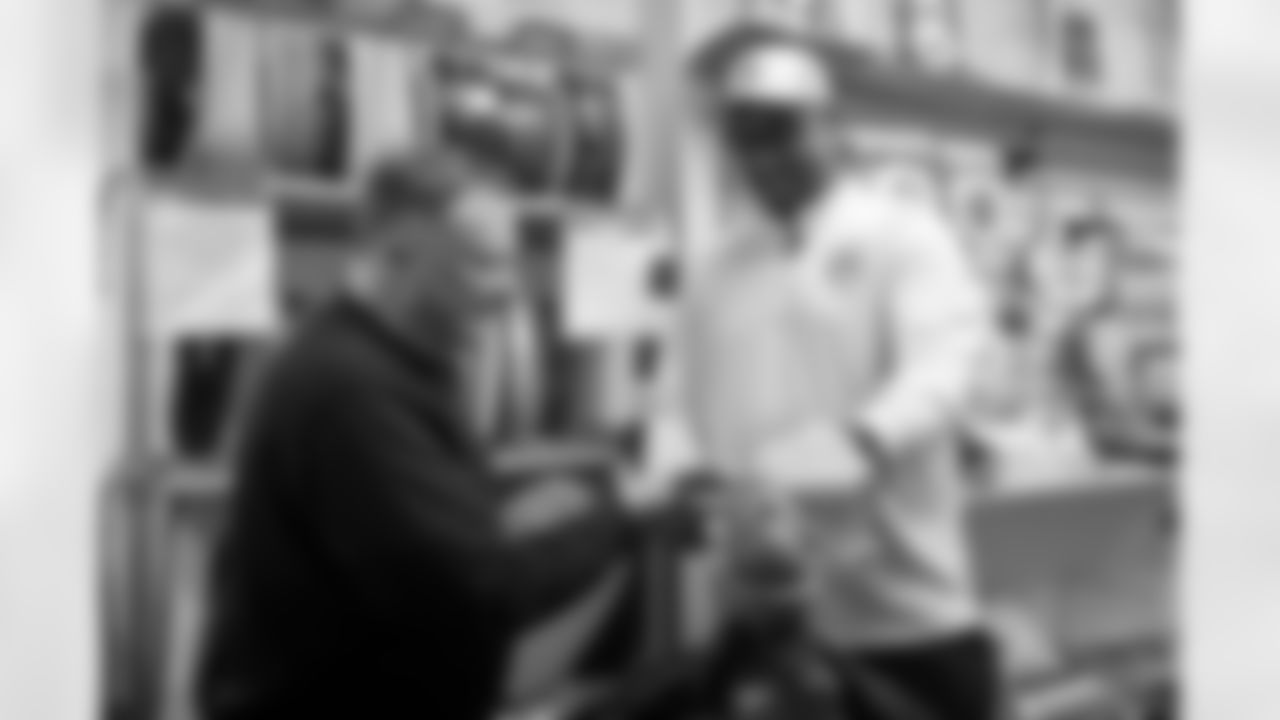 Pittsburgh Steelers legend Max Starks gives out Terrible Towels to locals on Tuesday, Sept. 23, 2025 in Galway, Ireland. (Brendan Moran / Pittsburgh Steelers)