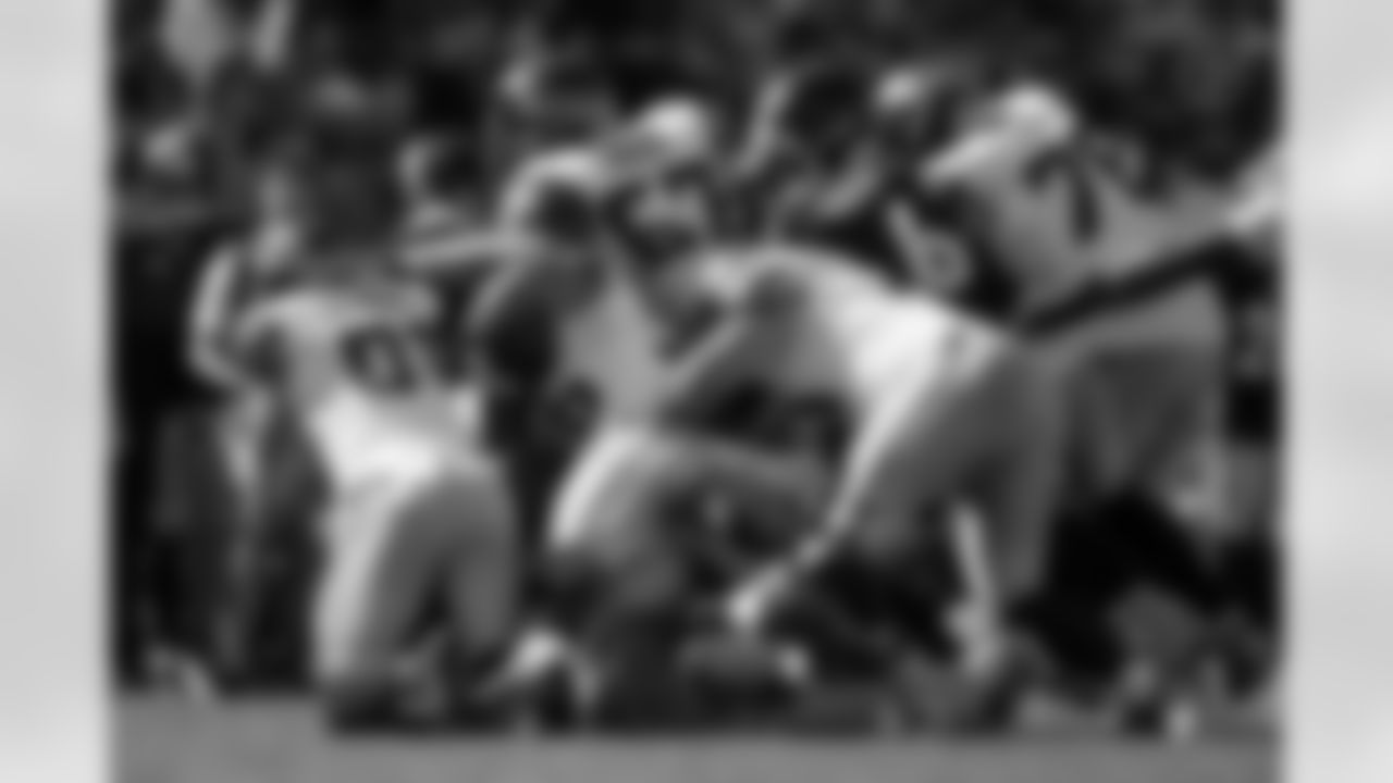 Pittsburgh Steelers linebacker Patrick Queen (6), Pittsburgh Steelers linebacker Cole Holcomb (55) and Pittsburgh Steelers linebacker Nick Herbig (51) tackle an opponent during a regular season game against the Seattle Seahawks, Sunday, Sept. 14, 2025 in Pittsburgh, PA. The Seahawks beat the Steelers 31-17. (Alysa Rubin / Pittsburgh Steelers)