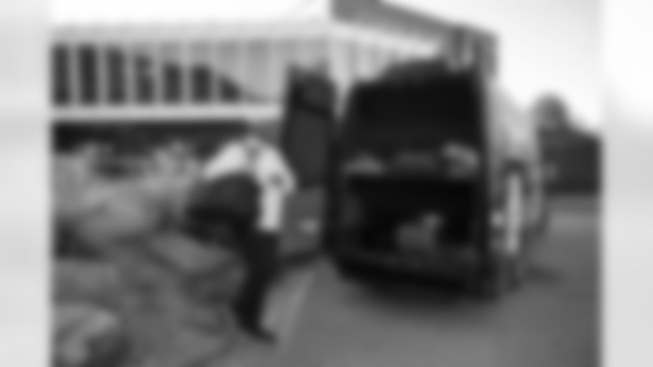 Pittsburgh Steelers legend Max Starks gives out Terrible Towels to locals on Tuesday, Sept. 23, 2025 in Killarney, Ireland. (Brendan Moran / Pittsburgh Steelers)