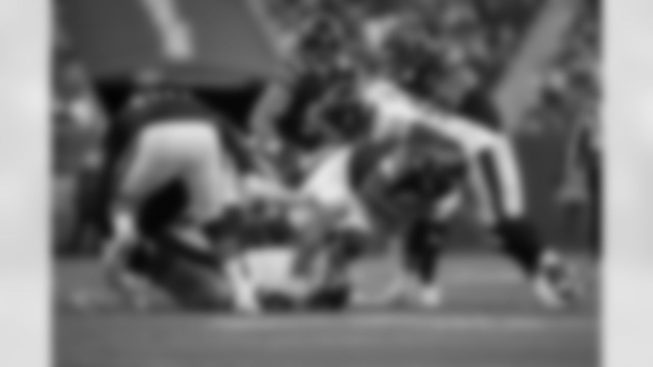 Pittsburgh Steelers linebacker T.J. Watt (90), Pittsburgh Steelers linebacker Cole Holcomb (55) and Pittsburgh Steelers defensive tackle Keeanu Benton (95) tackle an opponent during a regular season game against the Chicago Bears, Sunday, Nov. 23, 2025 in Chicago, IL. The Bears beat the Steelers 31-28. (Alysa Rubin / Pittsburgh Steelers)