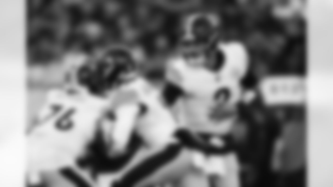 Pittsburgh Steelers quarterback Mason Rudolph (2) and Pittsburgh Steelers running back Kenneth Gainwell (14) during a regular season game between the Pittsburgh Steelers and the Chicago Bears, Sunday, Nov. 23, 2025 in Chicago, IL. (Alysa Rubin / Pittsburgh Steelers)