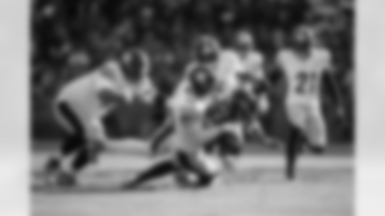 Pittsburgh Steelers linebacker T.J. Watt (90) tackles his opponent during a regular season game against the Baltimore Ravens, Sunday, Dec. 7, 2025 in Baltimore, MD. The Steelers defeated the Ravens 27-22. (Alysa Rubin / Pittsburgh Steelers)