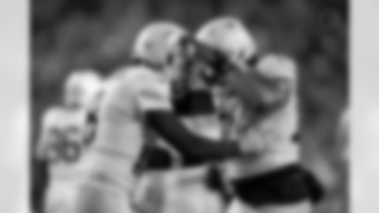 Pittsburgh Steelers quarterback Aaron Rodgers (8) and Pittsburgh Steelers offensive tackle Broderick Jones (77) during a regular season game between the Pittsburgh Steelers and the Green Bay Packers, Sunday, Oct. 26, 2025 in Pittsburgh, PA. The Packers beat the Steelers 35-25. (Karl Roser / Pittsburgh Steelers)