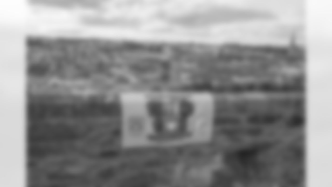 Pittsburgh Steelers legend Max Starks gives out Terrible Towels to locals on Wednesday, Sept. 24, 2025 in Belfast, Ireland. (Josh Veon / Pittsburgh Steelers)