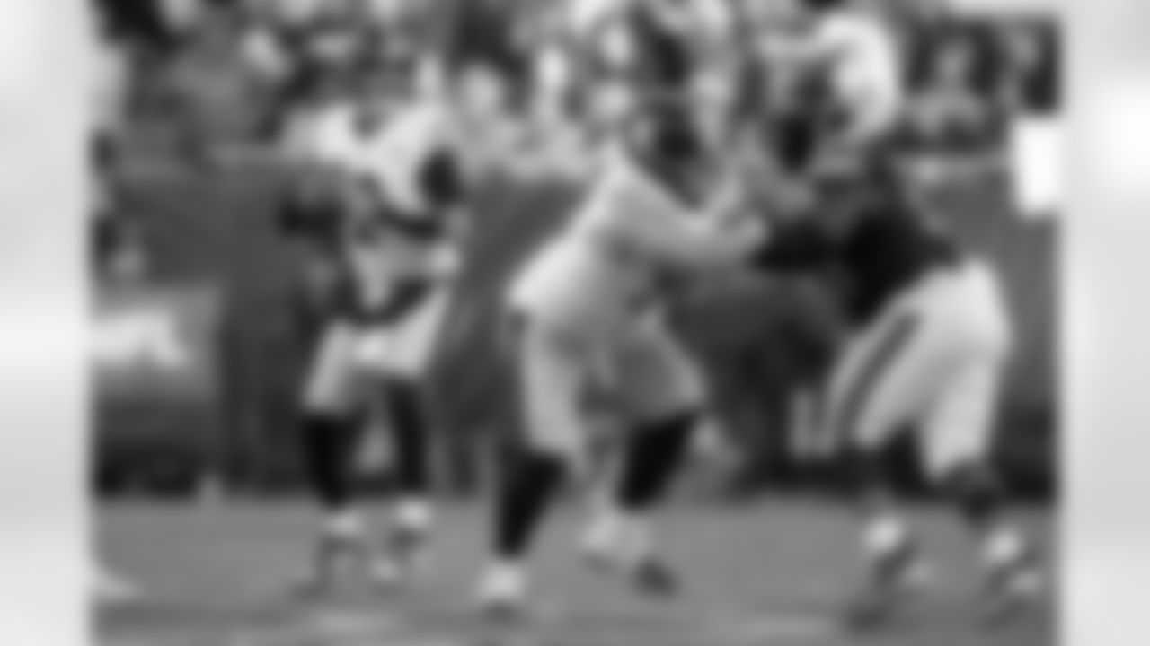 Pittsburgh Steelers quarterback Mason Rudolph (2) and Pittsburgh Steelers center Zach Frazier (54) during a regular season game between the Pittsburgh Steelers and the Chicago Bears, Sunday, Nov. 23, 2025 in Chicago, IL. The Bears beat the Steelers 31-28. (Nick Smith / Pittsburgh Steelers)