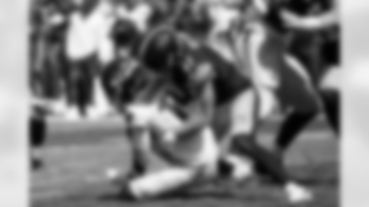 Pittsburgh Steelers linebacker Payton Wilson (41) sacks Seattle Seahawks quarterback Sam Darnold (14) during a regular season game between the Pittsburgh Steelers and the Seattle Seahawks, Sunday, Sept. 14, 2025 in Pittsburgh, PA. The Seahawks beat the Steelers 31-17. (Taylor Ollason / Pittsburgh Steelers)