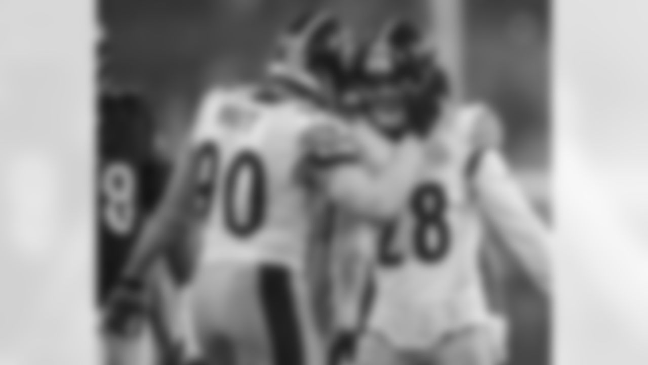 Pittsburgh Steelers linebacker T.J. Watt (90) and Pittsburgh Steelers safety Miles Killebrew (28) during a regular season game between the Pittsburgh Steelers and the Baltimore Ravens, Saturday, Jan. 6, 2024 in Baltimore, MD. The Steelers defeated the Ravens 17-10. (Karl Roser / Pittsburgh Steelers)