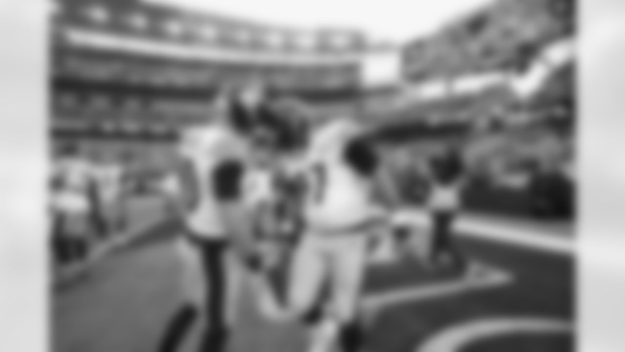 Pittsburgh Steelers quarterback Mitch Trubisky (10) Pittsburgh Steelers defensive tackle Cameron Heyward (97) during a regular season game between the Pittsburgh Steelers and the Cincinnati Bengals, Sunday, Nov. 26, 2023 in Cincinnati, OH. (Abigail Dean / Pittsburgh Steelers)
