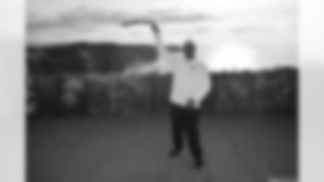 Pittsburgh Steelers legend Max Starks gives out Terrible Towels to locals at the Cliffs of Moher on Tuesday, Sept. 23, 2025 in County Clare, Ireland. (Brendan Moran / Pittsburgh Steelers)