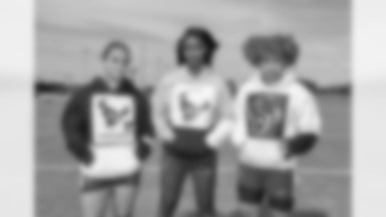 An image from the April 21st, 2025 Girls Flag She's Next Refried Merch in Houston, TX.