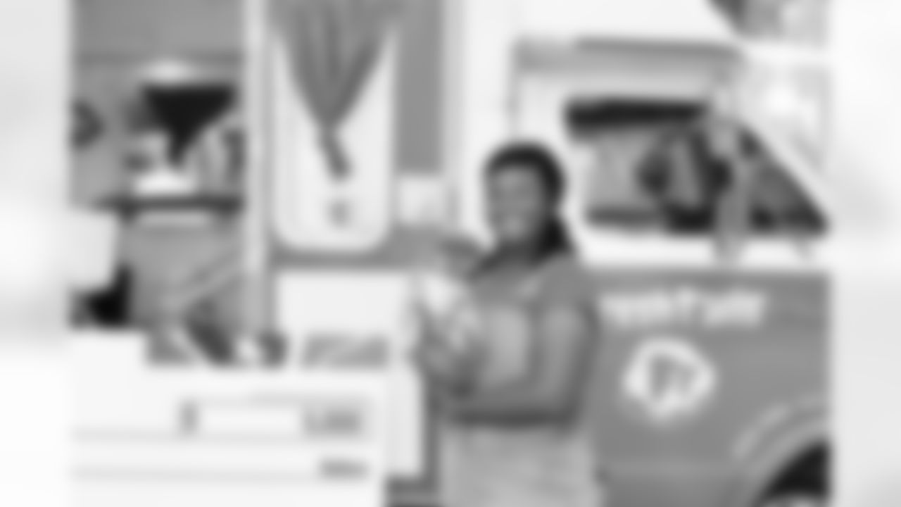 An image from the December 12th, 2025 Fresh Tails Small Business Boost at NRG Stadium in Houston, TX.