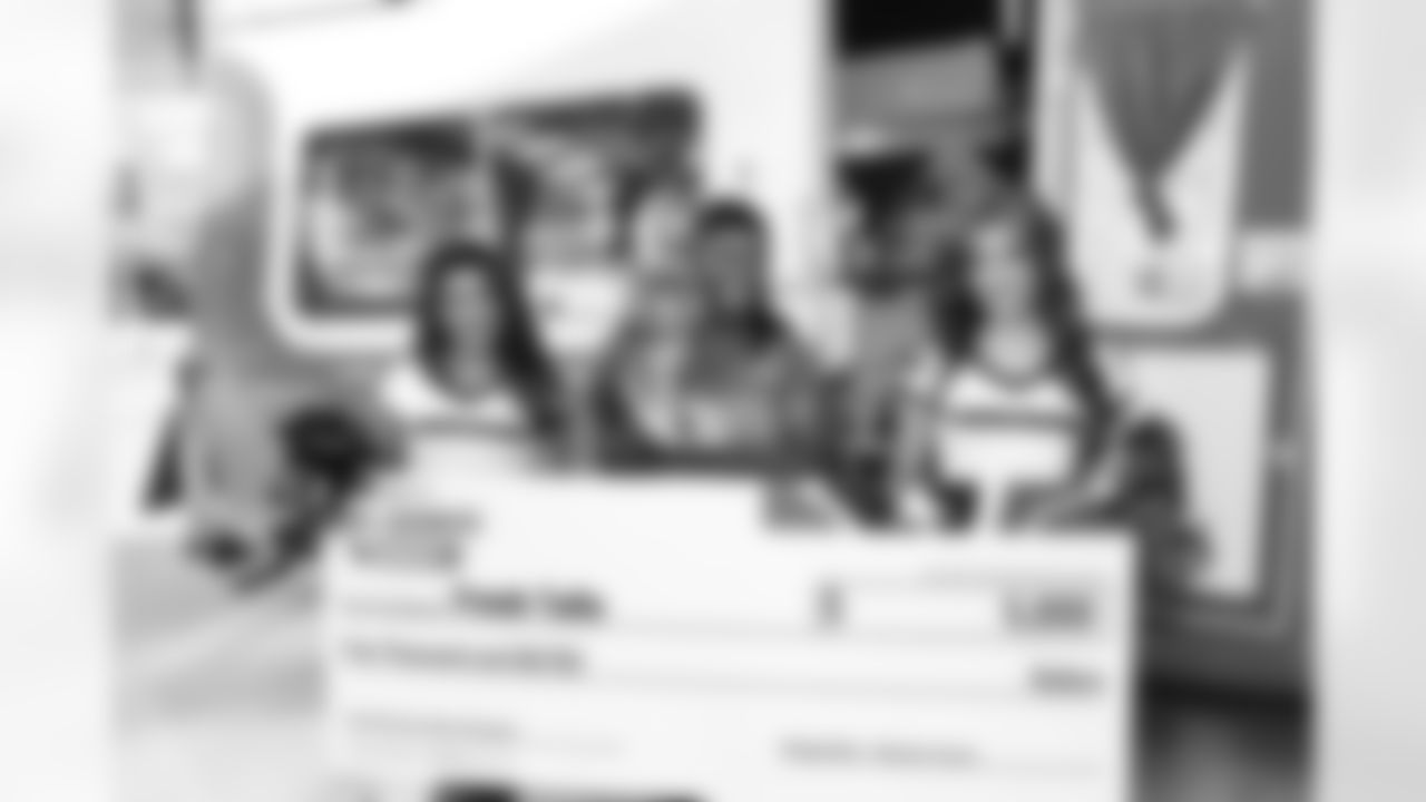 An image from the December 12th, 2025 Fresh Tails Small Business Boost at NRG Stadium in Houston, TX.