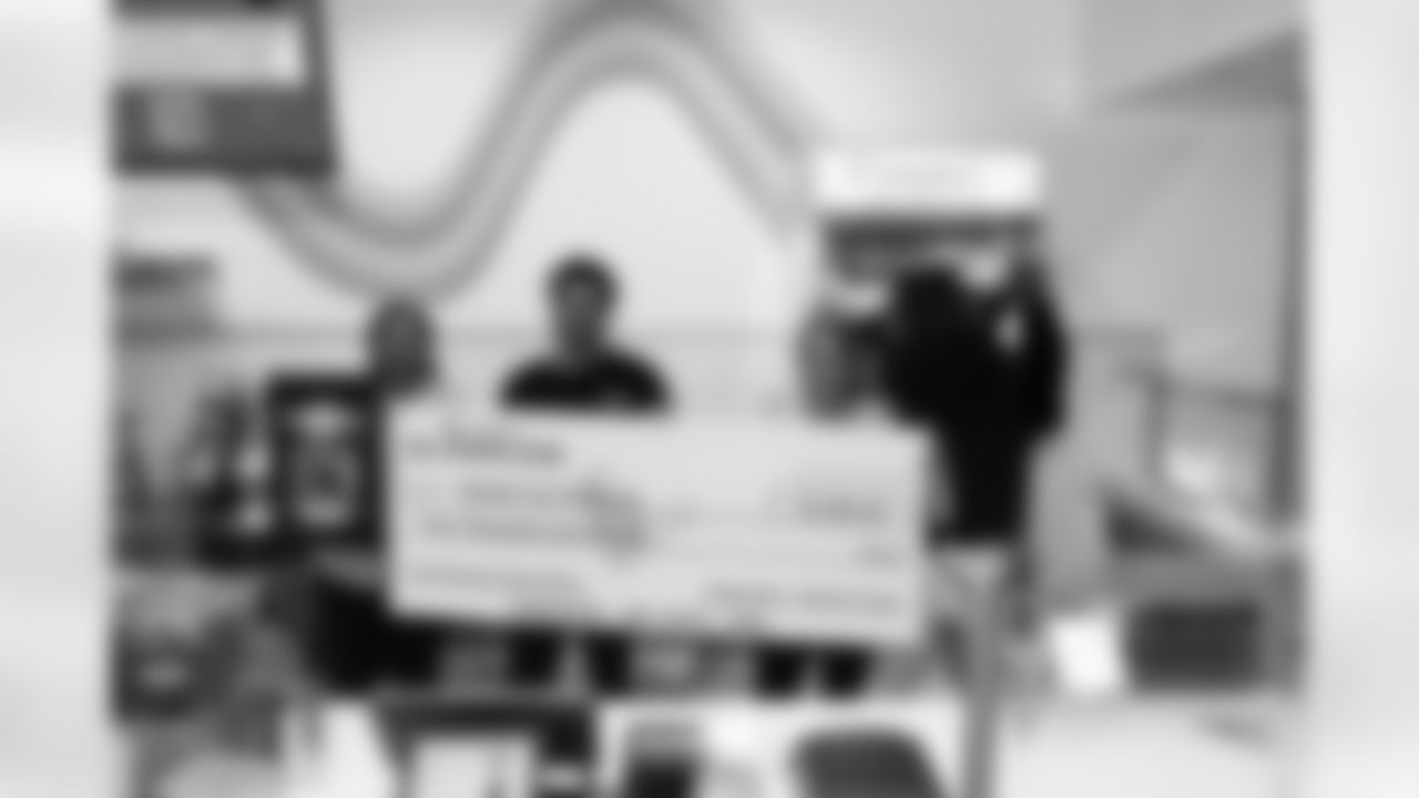 A November 9th, 2023 image from the Small Business Boost Surprise at Cosmic Ice Cream in Houston, TX.