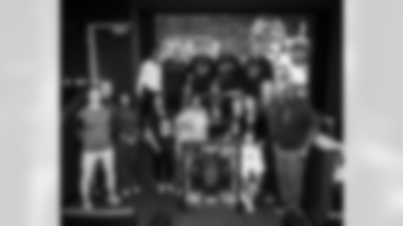 An image from the Oct. 28, 2025 Walter Payton Man of the Year Nominee surprise for Azeez Al-Shaair at NRG Stadium in Houston, TX.