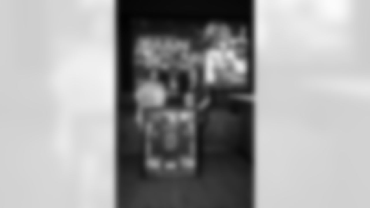 An image from the Oct. 28, 2025 Walter Payton Man of the Year Nominee surprise for Azeez Al-Shaair at NRG Stadium in Houston, TX.