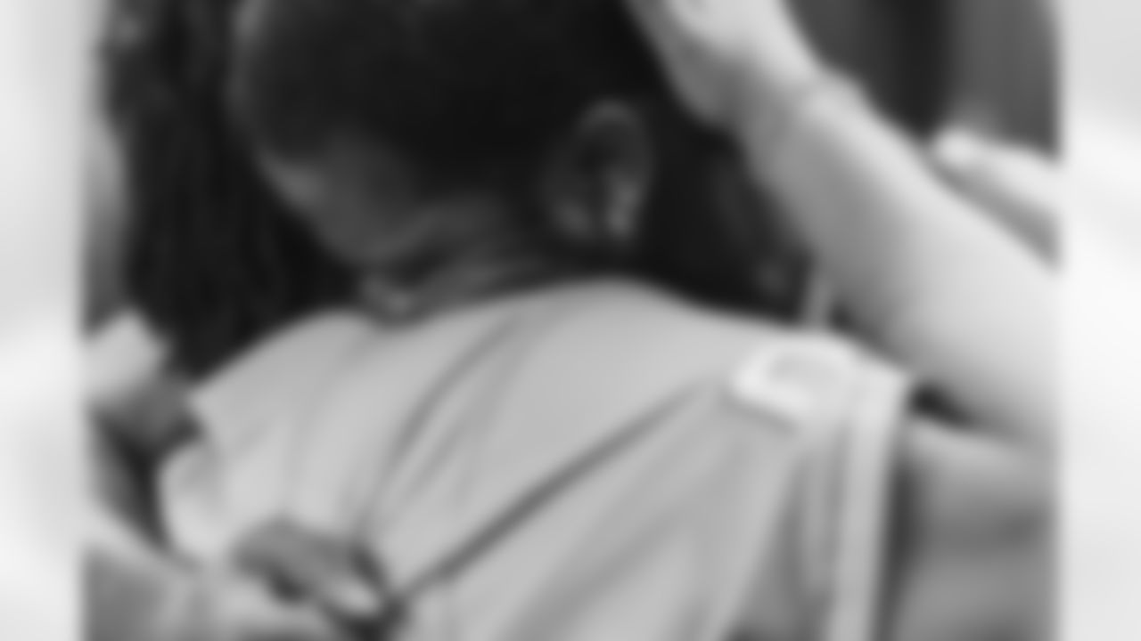 An image from the Oct. 28, 2025 Walter Payton Man of the Year Nominee surprise for Azeez Al-Shaair at NRG Stadium in Houston, TX.