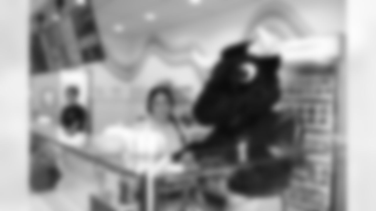 A November 9th, 2023 image from the Small Business Boost Surprise at Cosmic Ice Cream in Houston, TX.