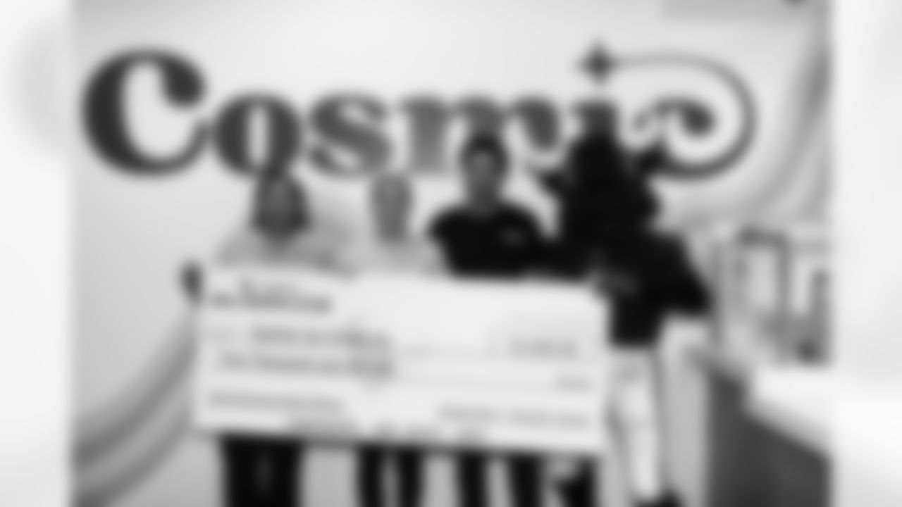 A November 9th, 2023 image from the Small Business Boost Surprise at Cosmic Ice Cream in Houston, TX.