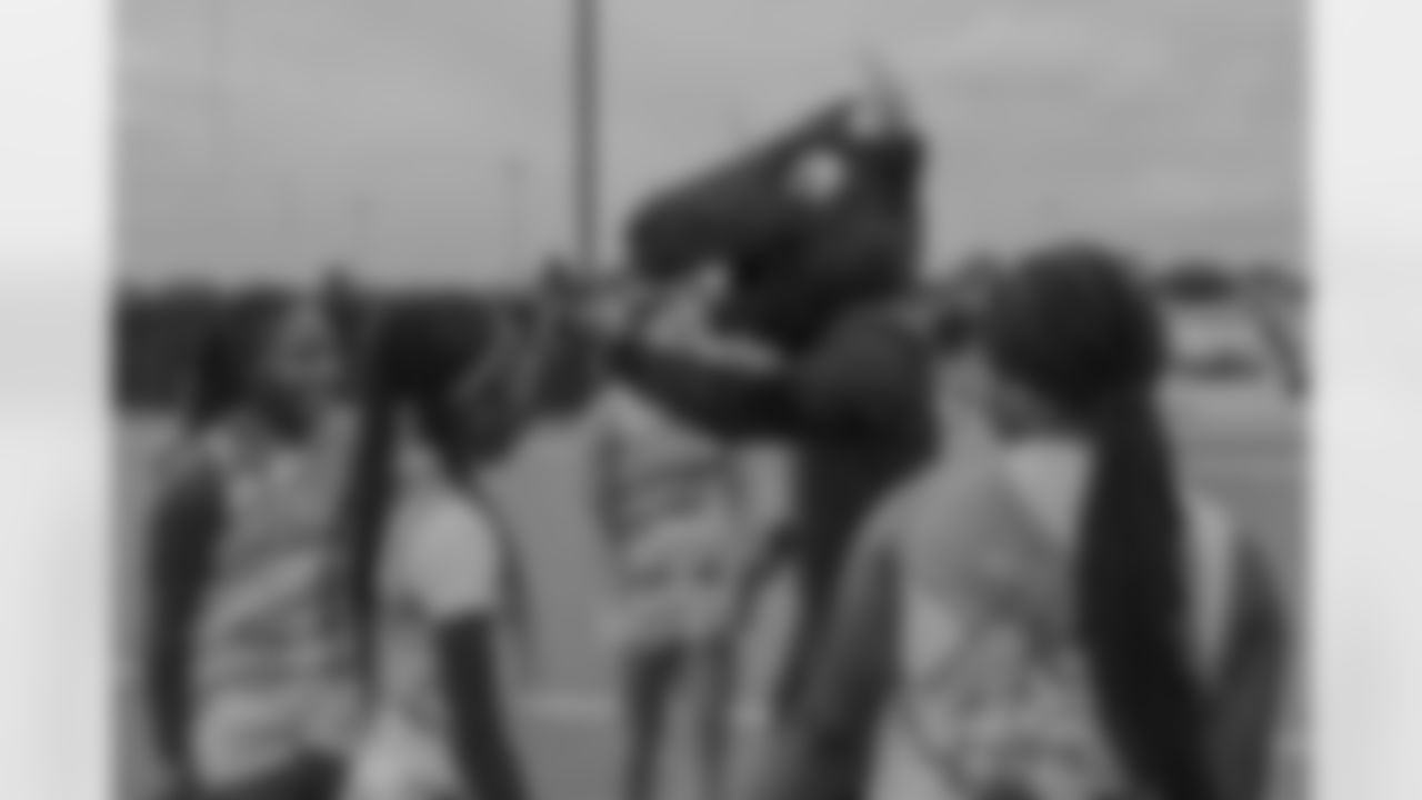 An image from the June 11th, 2025 NFL Flag Gifting Surprise in Houston, TX.
