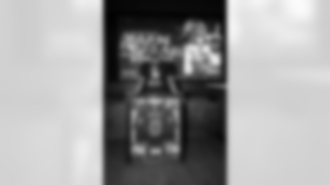 An image from the Oct. 28, 2025 Walter Payton Man of the Year Nominee surprise for Azeez Al-Shaair at NRG Stadium in Houston, TX.