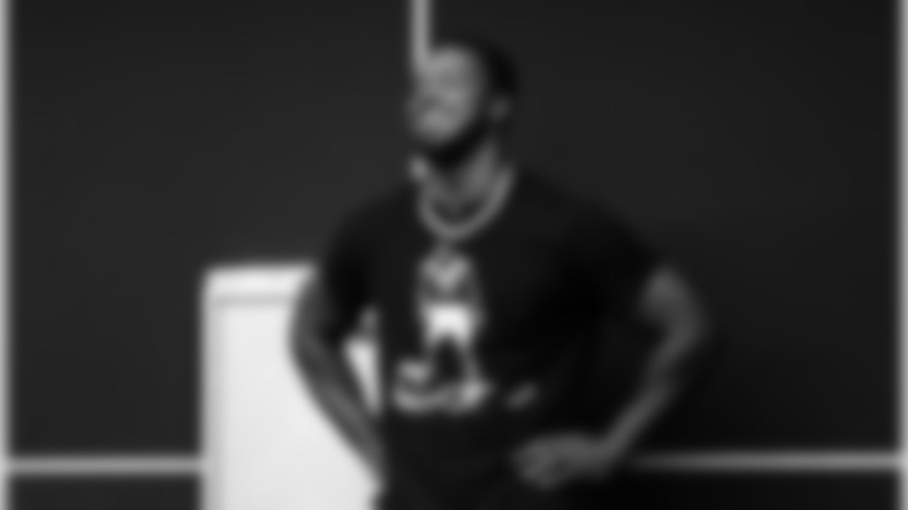 An image from the Oct. 28, 2025 Walter Payton Man of the Year Nominee surprise for Azeez Al-Shaair at NRG Stadium in Houston, TX.