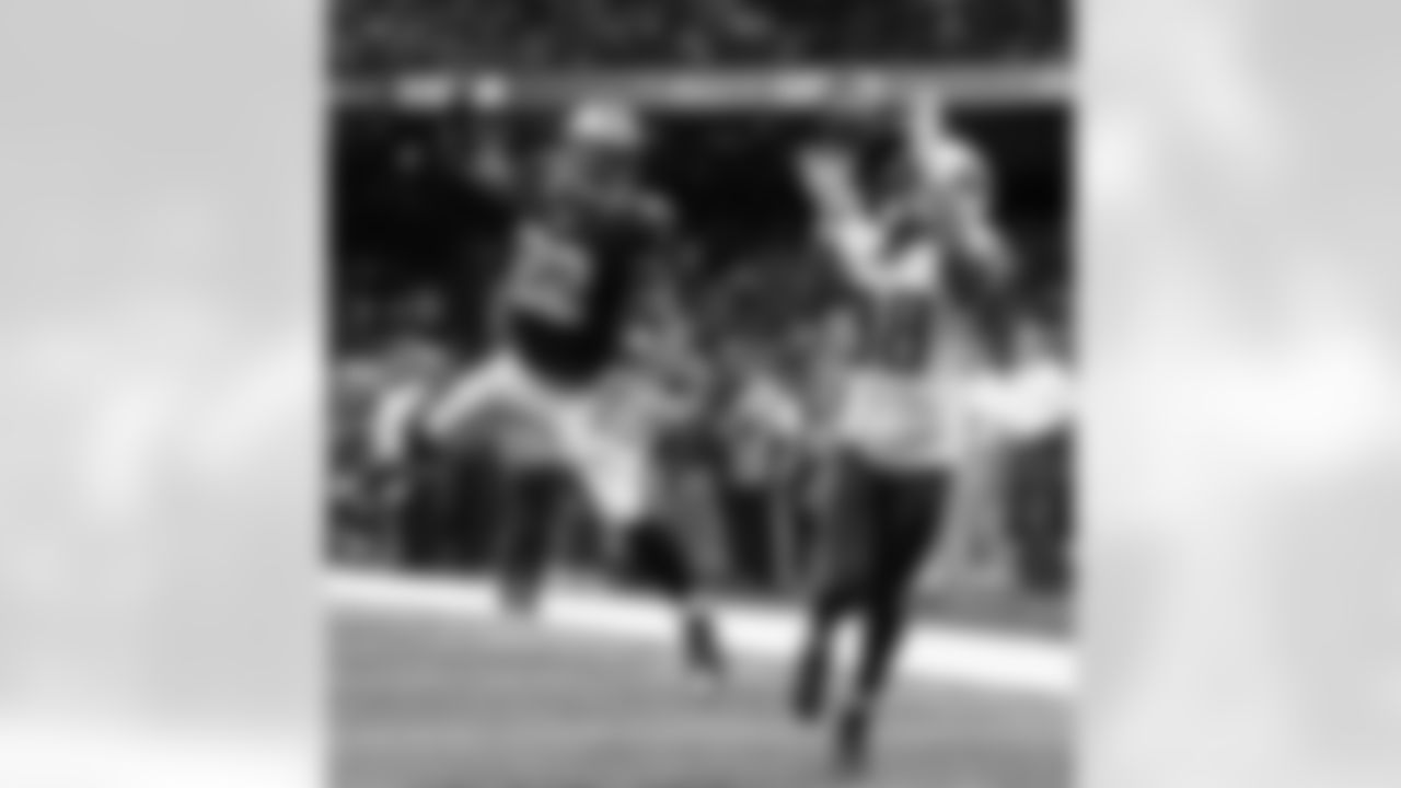 Tennessee Titans cornerback B.W. Webb (38) pulls in an interception on a pass intended for New Orleans Saints running back Mark Ingram (22) in the second half of an NFL football game in New Orleans, Sunday, Nov. 8, 2015. (AP Photo/Jonathan Bachman)