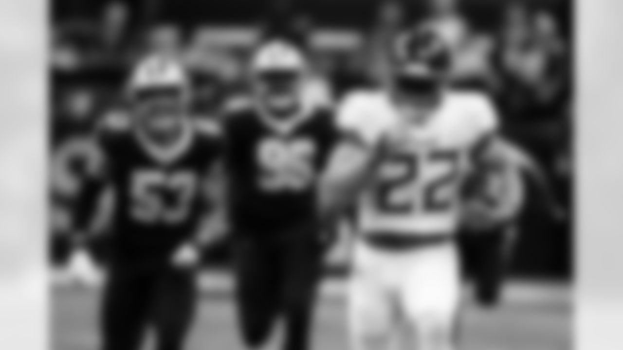 Tennessee Titans running back Derrick Henry carries the ball during the first half of an NFL football game against the New Orleans Saints Tuesday, Sept. 12, 2023, in New Orleans. (AP Photo/Butch Dill)