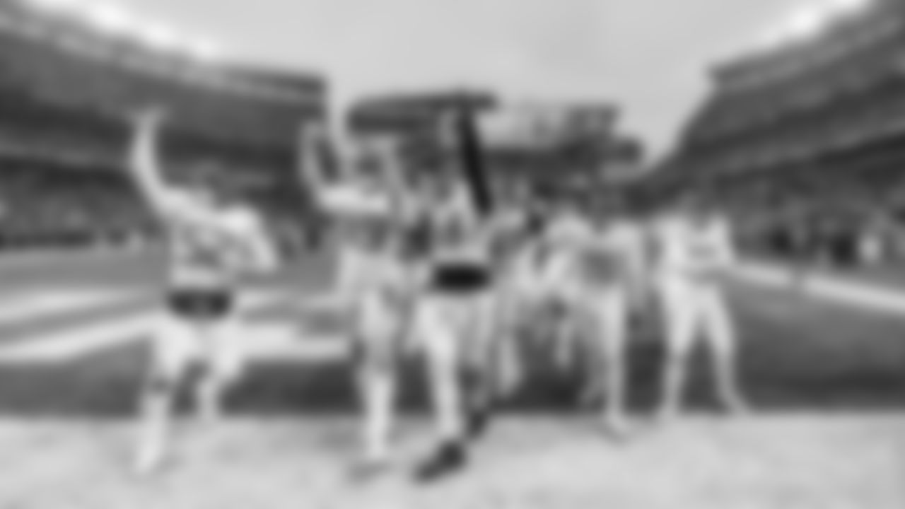 Linebacker James Williams Sr. #52 of the Tennessee Titans, Outside linebacker Arden Key #49 of the Tennessee Titans, Outside linebacker Jihad Ward #53 of the Tennessee Titans, Defensive end Sebastian Joseph-Day #69 of the Tennessee Titans, Cornerback Marcus Harris #26 of the Tennessee Titans, Defensive back Amani Hooker #37 of the Tennessee Titans during the game between the Tennessee Titans and the Cleveland Browns at Huntington Bank Field on December 07, 2025 in Cleveland, OH. Photo By Donald Page/Tennessee Titans