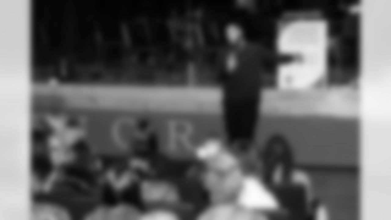 Defensive lineman Jeffery Simmons #98 of the Tennessee Titans speaks to Hunters Lane High School Girls Flag Football team after giving a donation on December 09, 2025 in Nashville, TN. Photo By Donald Page/Tennessee Titans