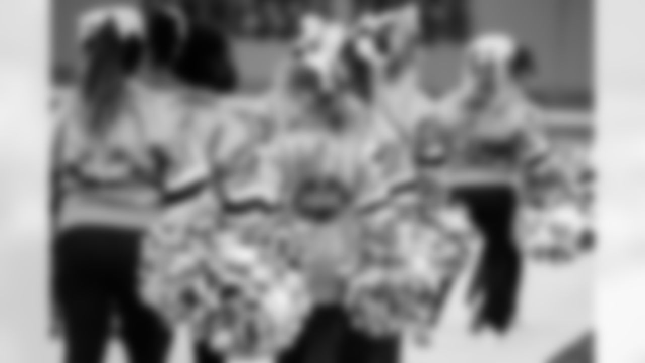 Tennessee Titans Cheerleaders performing with their Jr. Titans Cheer team on the field before the game between the Tennessee Titans and the Los Angeles Chargers at Nissan Stadium on November 02, 2025 in Nashville, TN. Photo By Kaitlyn Hungerford/Tennessee Titans