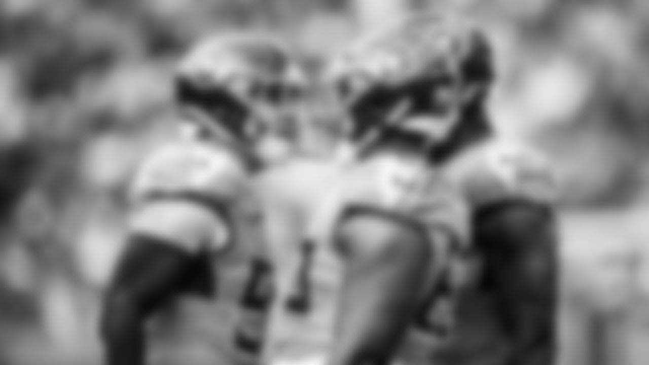 Linebacker Cody Barton #50 of the Tennessee Titans and Defensive end Sebastian Joseph-Day #69 of the Tennessee Titans during the game between the Tennessee Titans and the Los Angeles Chargers at Nissan Stadium on November 02, 2025 in Nashville, TN. Photo By Beau Brune/Tennessee Titans