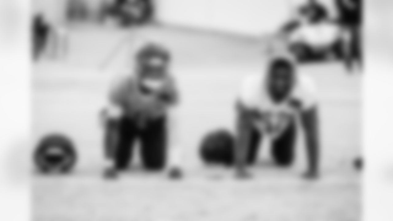 Quarterback Cam Ward #1 of the Tennessee Titans and Linebacker James Williams Sr. #52 of the Tennessee Titans during practice at the Ascension Saint Thomas Sports Park on January 2, 2026 in Nashville, TN. Photo By Donald Page/Tennessee Titans