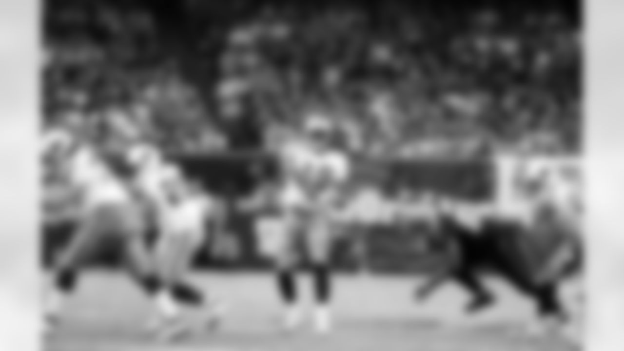 Tennessee Titans Vince Young (10) passes downfield during a game against the New Orleans Saints in New Orleans, Monday, Sept. 24, 2007.  (AP Photo/Judi Bottoni)