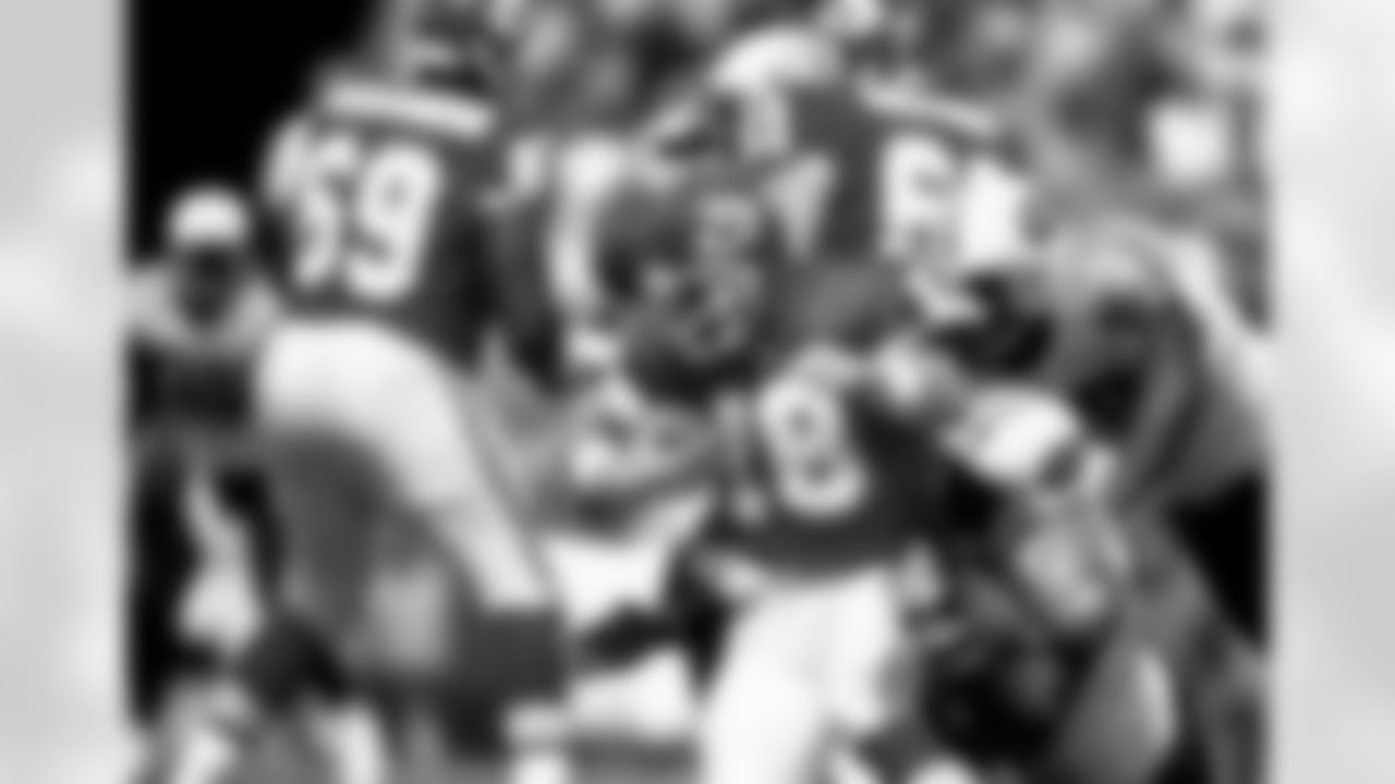 Kansas City Chiefs quarterback Elvis Grbac (18) is tackled during an NFL game against the Tennessee Titans Sept. 10, 2000,  in Nashville, Tenn. (Allen Kee via AP)