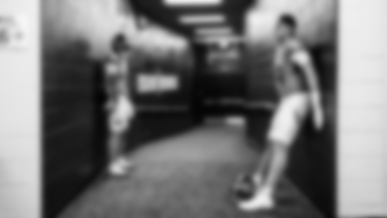 Wide receiver Elic Ayomanor #5 of the Tennessee Titans and Tight end Gunnar Helm #84 of the Tennessee Titans during the game between the Tennessee Titans and the Jacksonville Jaguars at Nissan Stadium on November 30, 2025 in Nashville, TN. Photo By Donald Page/Tennessee Titans