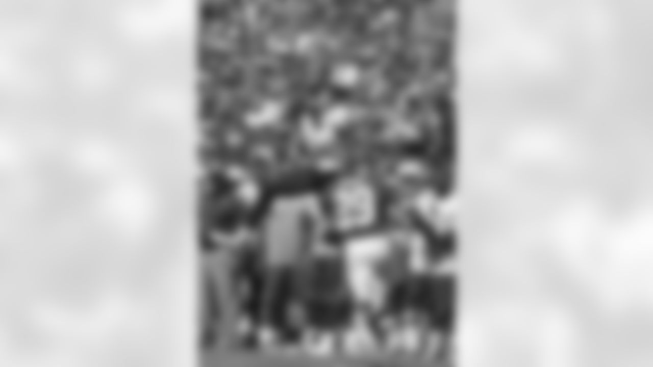 Tennessee Titans wide receiver Nate Washington (85) makes a catch over Kansas City Chiefs safety Eric Berry (29) in the second half of an NFL football game in Kansas City, Mo., Sunday, Sept. 7, 2014. (AP Photo/Ed Zurga)