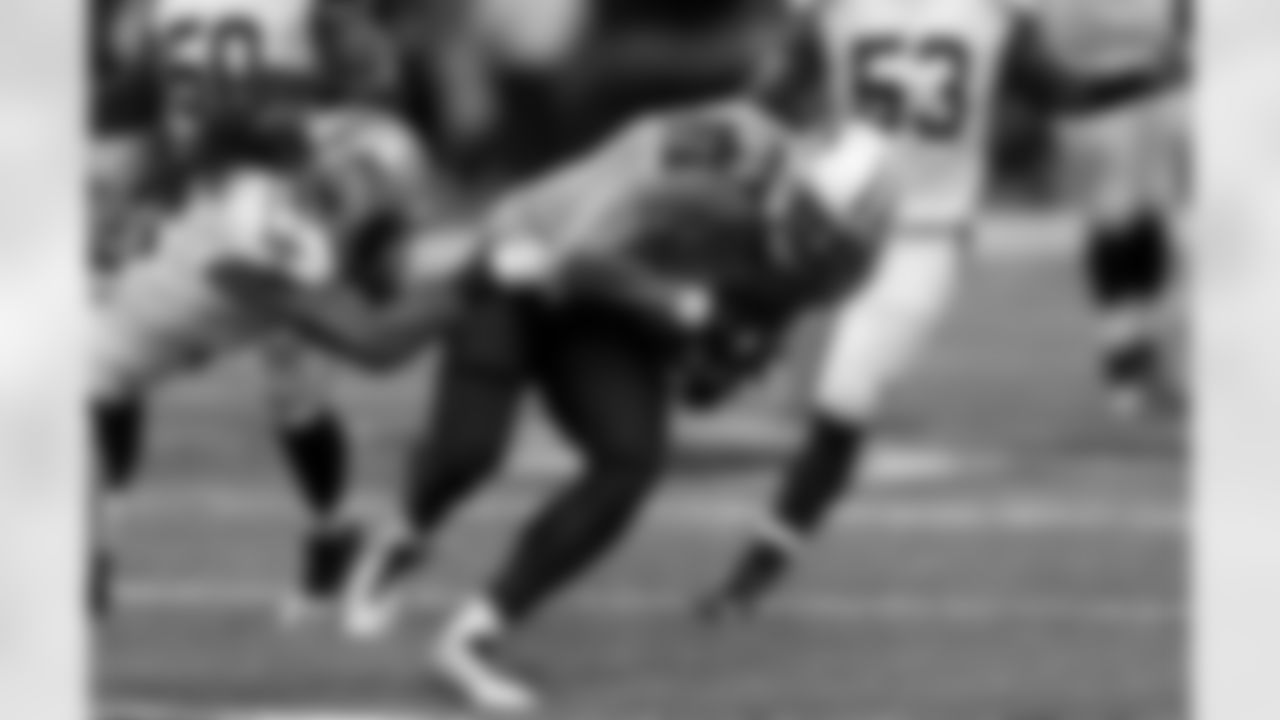 Tennessee Titans tight end Taylor Thompson (84) is tackled by New Orleans Saints defensive back Marcus Ball (36) after a reception in the first half of an NFL preseason football game in New Orleans, Friday, Aug. 15, 2014. (AP Photo/Rogelio Solis)