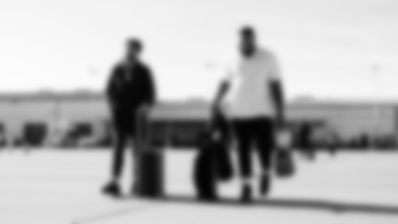 Defensive back Amani Hooker #37 of the Tennessee Titans andDefensive tackle Jeffery Simmons #98 of the Tennessee Titans during the travel day at the Nashville International Airport on December 13, 2025 in Nashville, TN. Photo by Donald Page/Tennessee Titans