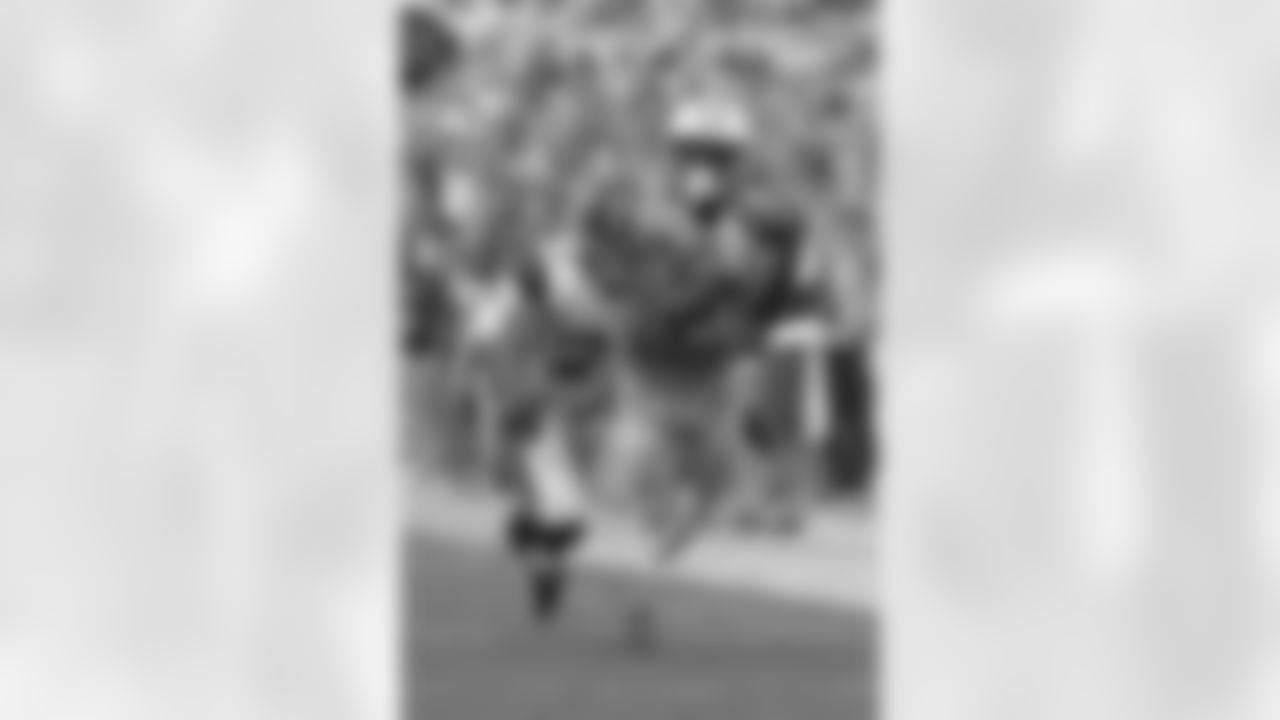 Tennessee Titans wide receiver Taywan Taylor (13) dives for a 42-yard catch in front of Jacksonville Jaguars cornerback A.J. Bouye (21) during the second half an NFL football game Sunday Sept. 17, 2017, in Jacksonville, Fla. The Titans won 37-16. (AP Photo/Phelan M. Ebenhack)