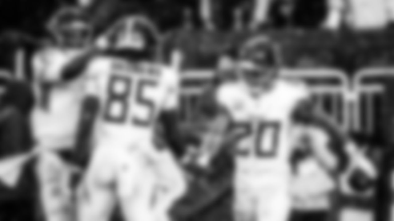 Quarterback Cam Ward #1 of the Tennessee Titans, Tight end Chig Okonkwo #85 of the Tennessee Titans, Running back Tony Pollard #20 of the Tennessee Titans during the game between the Tennessee Titans and the Cleveland Browns at Huntington Bank Field on December 07, 2025 in Cleveland, OH. Photo By Donald Page/Tennessee Titans