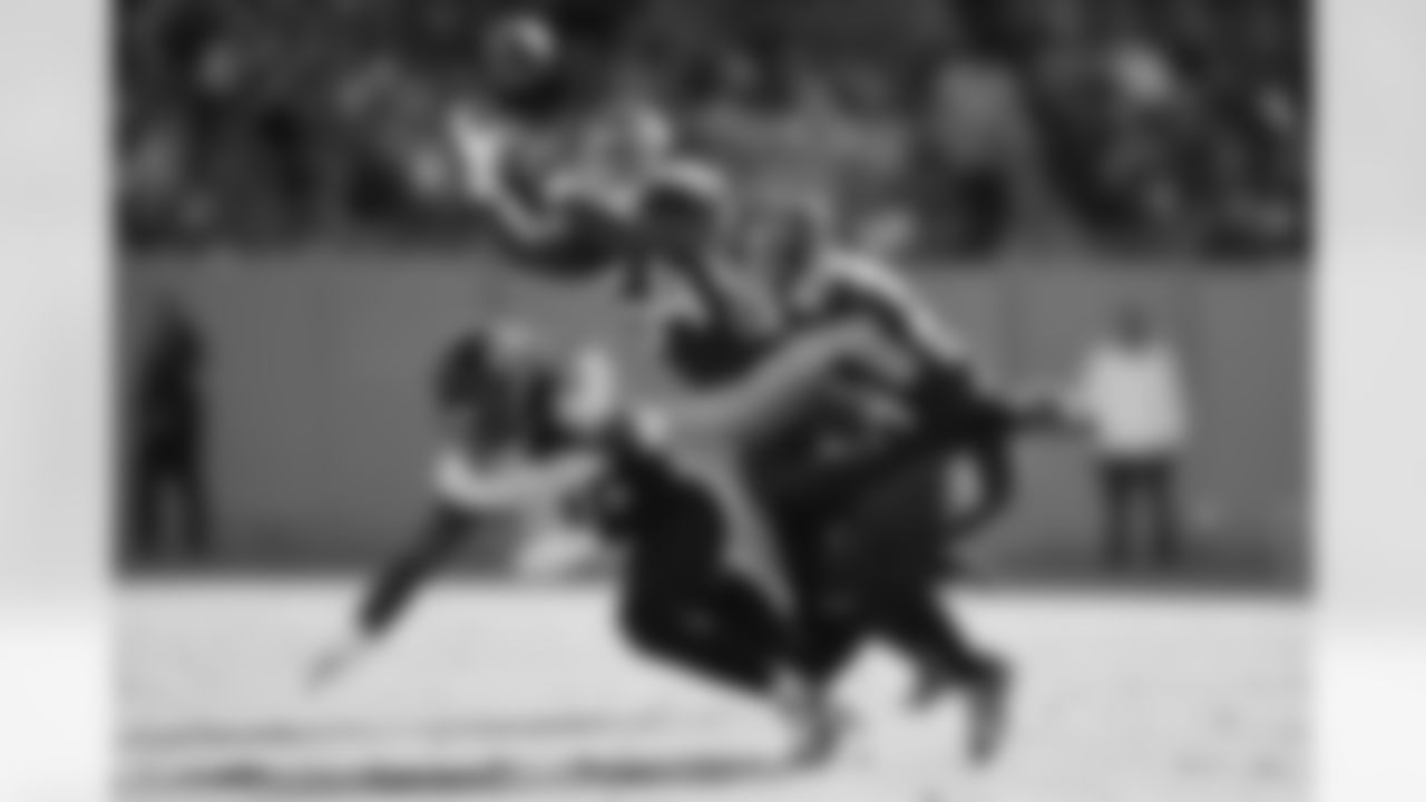 Tennessee Titans cornerback Elijah Molden (24) breaks up a pass that was intercepted by inside linebacker Rashaan Evans (54) against Jacksonville Jaguars wide receiver Laviska Shenault Jr. (10) during an NFL football game, Sunday, Dec. 12, 2021, in Nashville, Tenn. The Titans defeated the Jaguars 20-0. (Joe Robbins via AP)