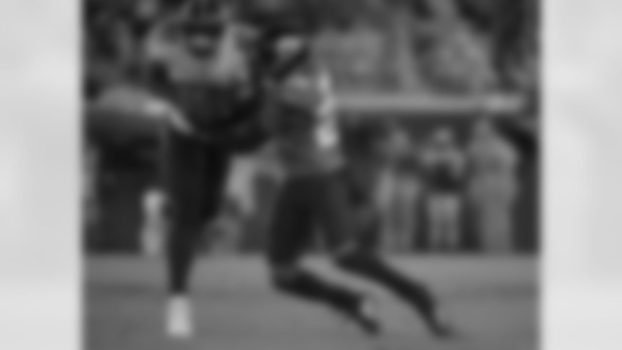 Jacksonville Jaguars cornerback Jalen Ramsey (20) stops Tennessee Titans tight end Delanie Walker (82) after a catch during the first half of an NFL football game Thursday, Sept. 19, 2019, in Jacksonville, Fla. (AP Photo/Phelan Ebenhack)