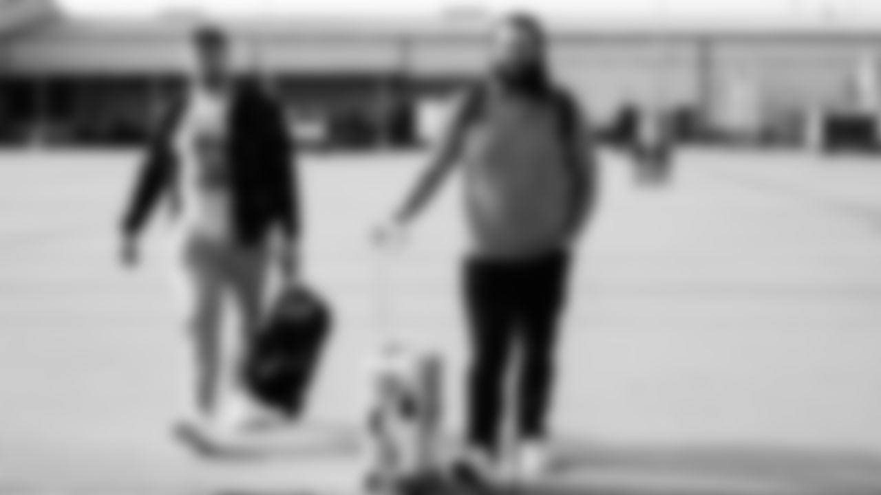 Guard Jackson Slater #64 of the Tennessee Titans and Center/Guard Corey Levin #62 of the Tennessee Titans during the travel day at the Nashville International Airport on January 03, 2026 in Nashville, TN. Photo by Jessie Rogers/Tennessee Titans